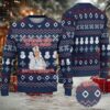 Black Ugly Christmas Sweater with Snowflake and Gift Pattern Featuring Hello Kitty by the Fireplace Black Ugly Christmas Sweater with Snowflake and Gift Pattern Featuring Hello Kitty by the Fireplace