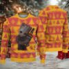 Green Ugly Christmas Sweater with Snowflake Pattern Featuring Hello Kitty Holding a Present Between Christmas Trees